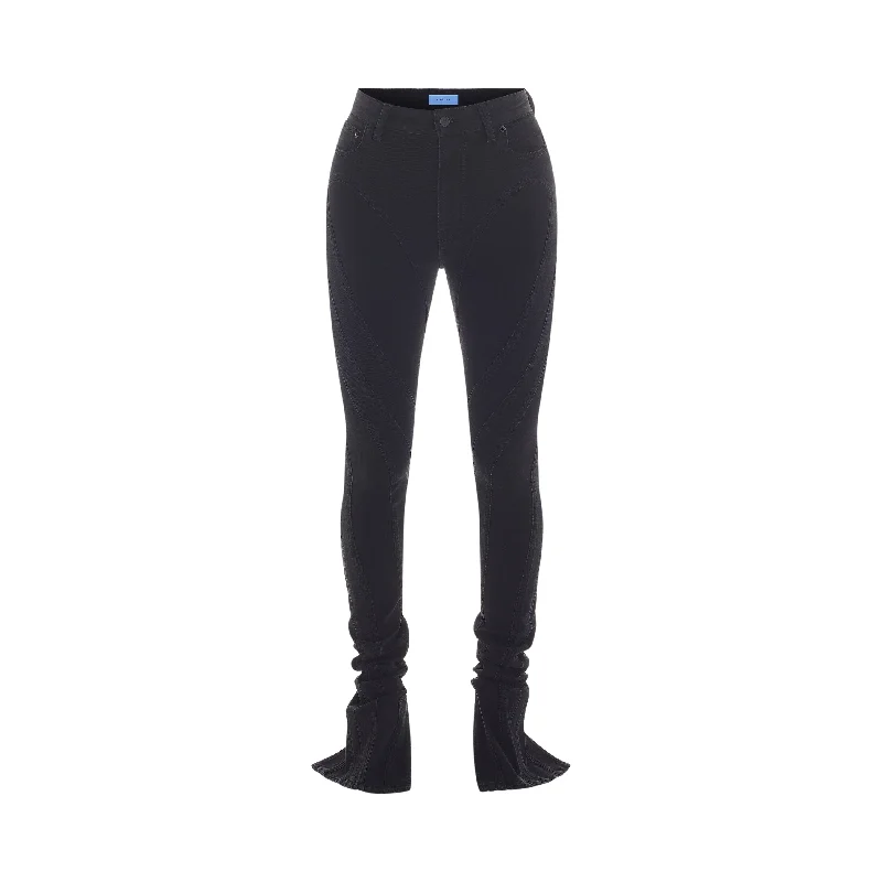 black slited bi-material spiral jeans