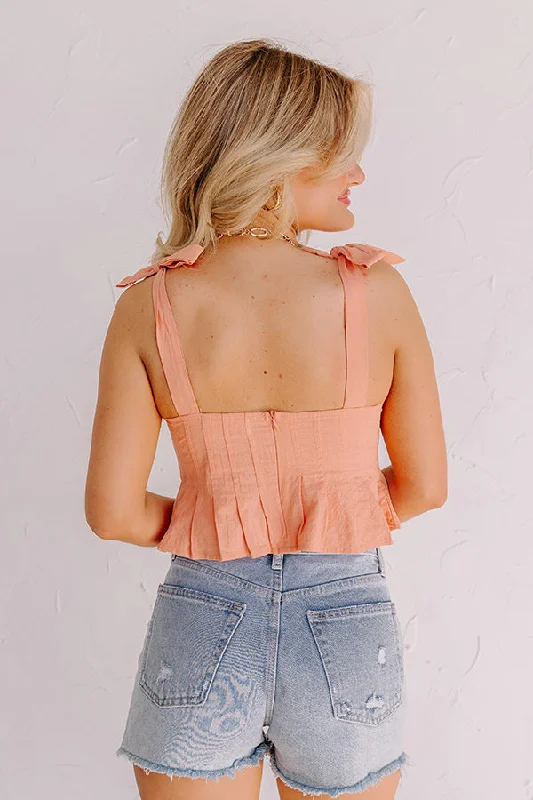 sunset-horizon-peplum-top-in-peach